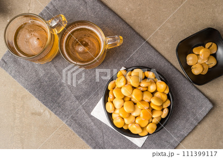 Tasty lupins and glass of beer 111399117