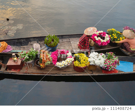 Damnoen Saduak Floating Market or Amphawa. Local people sell fruits, traditional food on boats in canal, Ratchaburi District, Thailand. Famous Asian tourist attraction destination. Festival in Asia. 111408724