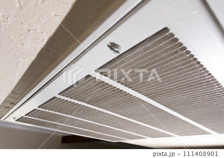 Closeup Intake Vent, Home Air Conditioner. HVAC System. Maintenance Stainless Steel Pleated Ac Furnace Filters With Carbon. Air Filter Allergen Reduction Dust. Horizontal Plane.  111408901
