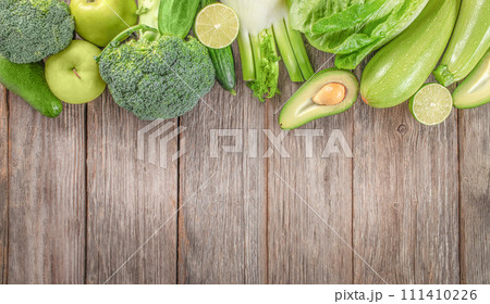 fresh green vegetables on a wooden background. top view. copy space 111410226