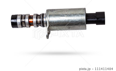 Electromagnetic crankshaft position sensor of a car engine in the hands of an auto mechanic. Spare parts catalog. Electromagnetic crankshaft position sensor of a car engine in the hands of an auto mechanic. Spare parts catalog. 111411484