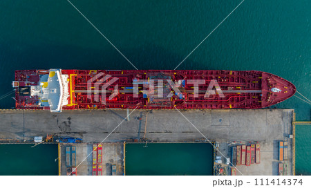 Aerial view crude oil tanker at port, Oil tanker loading and unloading in oil terminal station refinery, Global business import export logistic transport sea freight cargo tanker, Red crude oil tanker 111414374