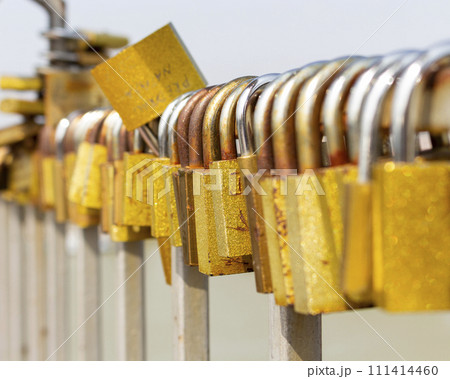 Padlocks of love on the bridge fence Padlocks of love on the bridge fence 111414460