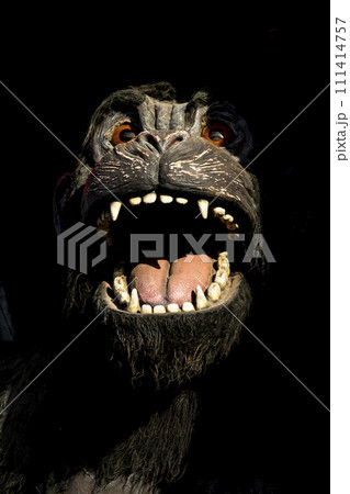Gorilla monster. Scary and angry gorilla with big jaws and evil eyes. Puppets, toys and statues Gorilla monster. Scary and angry gorilla with big jaws and evil eyes. Puppets, toys and statues 111414757