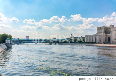View of the Moscow river embakment, Pushkinsky bridge and cruise ships at sunset. 111415877
