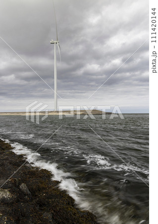 Wind turbines on edge of  national park Oosterschelde, Domburg - Vrouwenpolder, The Netherlands 111420144