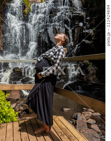 Woman enjoy at waterfall in Santa Catarina, Brazil. 111424694