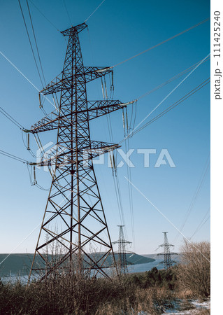 High voltage substation.World electricity crisis.Steel power transmission pylons 111425240