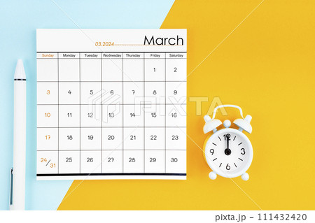 March 2024 Monthly calendar for 2024 year with pen on yellow and blue background. 111432420