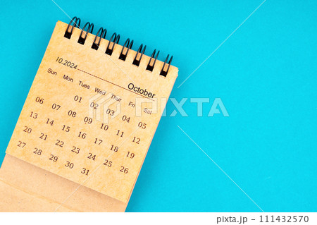 October 2024, Monthly desk calendar for 2024 year on blue color background. 111432570