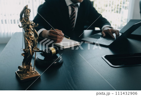 Judge gavel with Justice lawyers having team meeting at law firm background. Concepts of Law and Legal services. Judge gavel with Justice lawyers having team meeting at law firm background. Concepts of Law and Legal services. 111432906