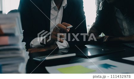 Finance manager meeting discussing company growth project success financial statistics, professional investor working start up project for strategy plan with document, laptop and digital tablet. Finance manager meeting discussing company growth project success financial statistics, professional investor working start up project for strategy plan with document, laptop and digital tablet. 111432978