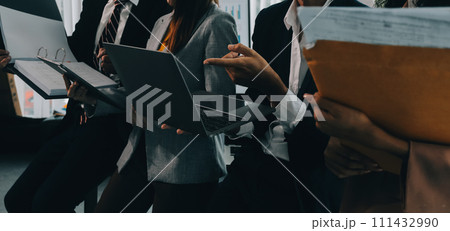 Co working conference, Business team meeting present, investor colleagues discussing new plan financial graph data on office table with laptop and digital tablet, Finance, accounting, investment. 111432990