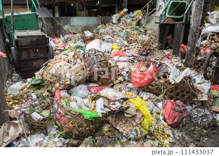 Pile of garbage plastic and trash bag waste in Ubud market of Bali, Indonesia. Bad management, Pollution trash. Pile of garbage plastic and trash bag waste in Ubud market of Bali, Indonesia. Bad management, Pollution trash. 111433037