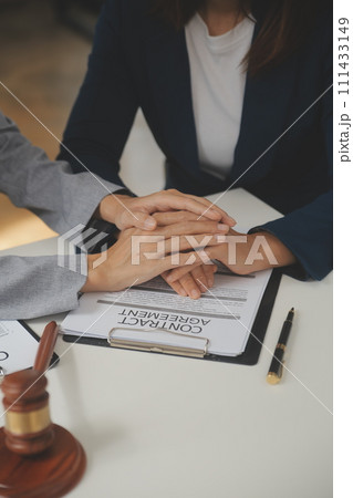 Lawyer, legal advisor, businessman brainstorming information on agreement details Business contracts in legal processing books for accuracy in contract documents. joint financial investment. Lawyer, legal advisor, businessman brainstorming information on agreement details Business contracts in legal processing books for accuracy in contract documents. joint financial investment. 111433149