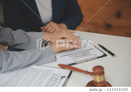 Lawyer, legal advisor, businessman brainstorming information on agreement details Business contracts in legal processing books for accuracy in contract documents. joint financial investment. Lawyer, legal advisor, businessman brainstorming information on agreement details Business contracts in legal processing books for accuracy in contract documents. joint financial investment. 111433150