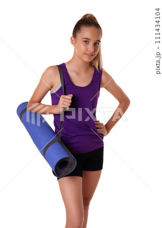 young beautiful slim teen girl with yoga mat isolated on white background 111434104