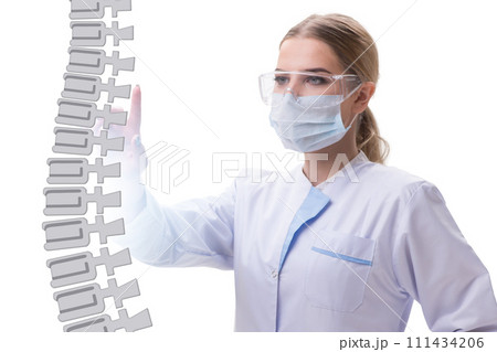 Medical concept with doctors and spine Medical concept with doctors and spine 111434206