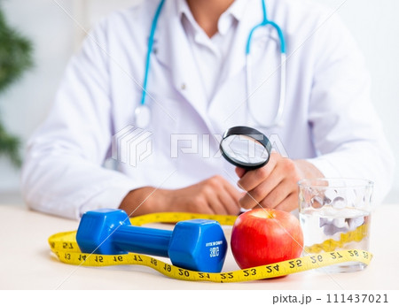 Young male doctor in sport and dieting concept 111437021