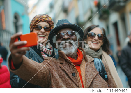 A group of seniors take a photo on a street A group of seniors take a photo on a street 111440492