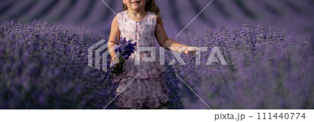 Lavender field girl. happy girl in pink dress in a lilac field of lavender. Aromatherapy concept, lavender oil, photo session in lavender 111440774