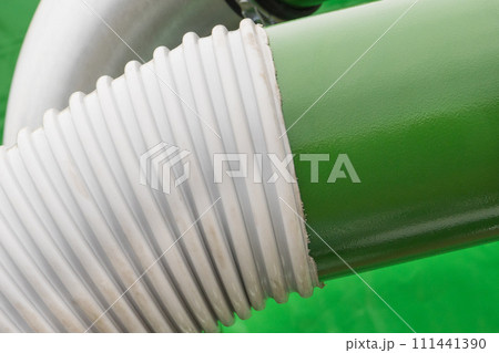 Plastic corrugated pipes in agricultural or industrial machine. Technology concept 111441390