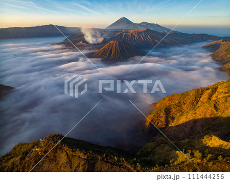 Aerial drone view of Bromo active volcano at sunrise,Tengger Semeru national park, East Java, Indonesia Aerial drone view of Bromo active volcano at sunrise,Tengger Semeru national park, East Java, Indonesia 111444256