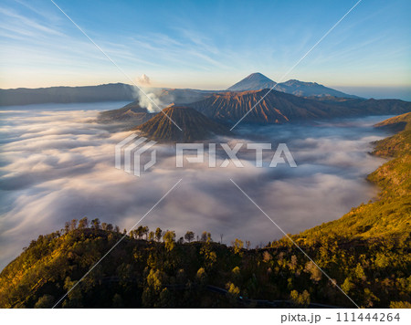 Aerial drone view of Bromo active volcano at sunrise,Tengger Semeru national park, East Java, Indonesia Aerial drone view of Bromo active volcano at sunrise,Tengger Semeru national park, East Java, Indonesia 111444264