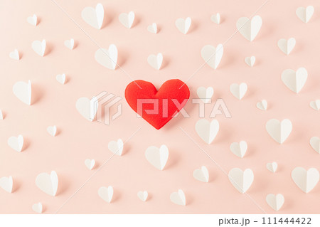 Happy Valentines Day background. Top view flat lay of paper elements cutting white hearts shape flying on pink background with copy space, Happy Mother's Day, Banner template design of holiday 111444422