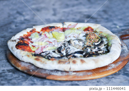 Hawaiian pizza and pesto mushroom pizza ,half and half topping pizza or split half topping pizza Hawaiian pizza and pesto mushroom pizza ,half and half topping pizza or split half topping pizza 111446041
