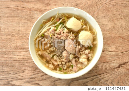 boiled slice soft and chop pork and meatball in clear soup on bowl boiled slice soft and chop pork and meatball in clear soup on bowl 111447481