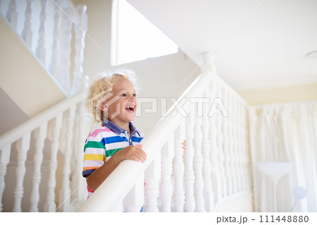 Kids on stairs. Child moving into new home. Kids on stairs. Child moving into new home. 111448880
