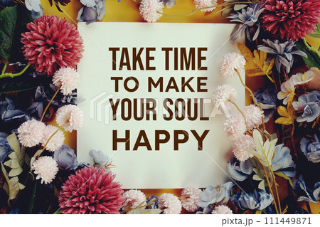"Take time to Make Your Soul Happy" Inspirational quotes text message with flower decoration on yellow background 111449871