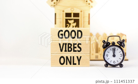 Good vibes only symbol. Concept word Good vibes only on beautiful wooden block. Black alarm clock. Beautiful white table white background. Business motivational good vibes only concept. Copy space. Good vibes only symbol. Concept word Good vibes only on beautiful wooden block. Black alarm clock. Beautiful white table white background. Business motivational good vibes only concept. Copy space. 111451337