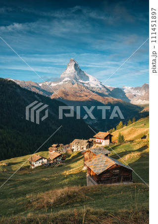 Landscape of Matterhorn iconic mountain with rustic village on hill in Findeln, Switzerland 111451897
