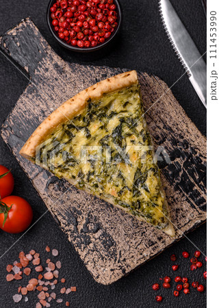 Delicious crispy quiche cut into slices with cheese, broccoli, tomatoes Delicious crispy quiche cut into slices with cheese, broccoli, tomatoes 111453990