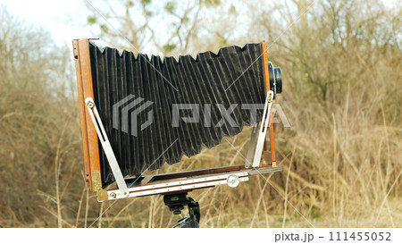 Large format vintage camera details closeups, wooden large format 24X30 tilt shift focusing moving focus lens, 120 years old technology, historical museum specimen, rare professional collection 111455052