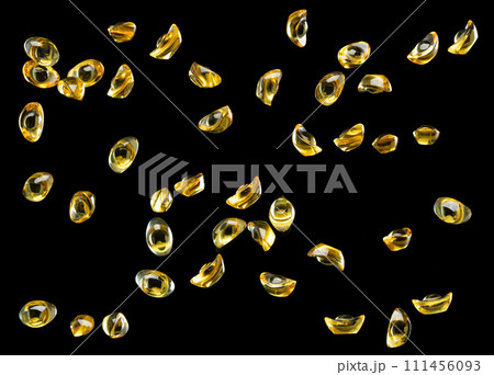 Chinese ornament gold ingot bar. Decoration element of chinese gold ingots or Yuanbao money for Festival. Other language mean rich wealthy prosperity. Black background isolated 111456093