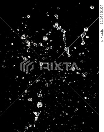 Shape form throw of Water splashes into drop water attack fluttering in air and stop motion freeze shot. Splash Water for explosion texture graphic resource elements, black background isolated Shape form throw of Water splashes into drop water attack fluttering in air and stop motion freeze shot. Splash Water for explosion texture graphic resource elements, black background isolated 111456104