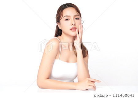 Beautiful young asian woman with clean fresh skin on white background, Face care, Facial treatment, Cosmetology, beauty and spa, Asian women portrait. Beautiful young asian woman with clean fresh skin on white background, Face care, Facial treatment, Cosmetology, beauty and spa, Asian women portrait. 111460043