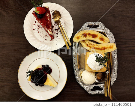 Several kinds of dessert on the wooden table Several kinds of dessert on the wooden table 111460501