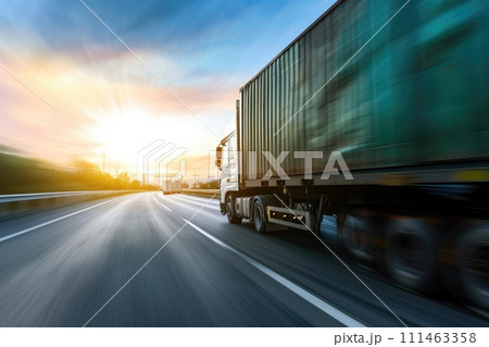 Truck with container on highway, cargo transportation concept. Fast delivery, blurred motion Truck with container on highway, cargo transportation concept. Fast delivery, blurred motion 111463358