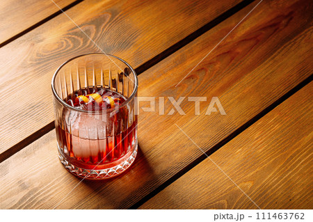Closeup on negroni cocktail in old fashion glass  111463762