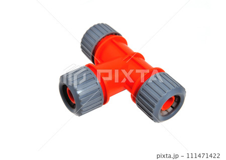 Triple adapter for watering hoses, white background close-up Triple adapter for watering hoses, white background close-up 111471422