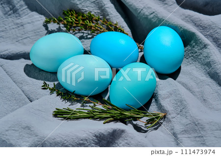Easter composition in blue shades. Painted eggs on a blue background. Easter composition in blue shades. Painted eggs on a blue background. 111473974