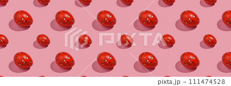 Easter composition pattern in red shades. Painted eggs on a pink background. 111474528
