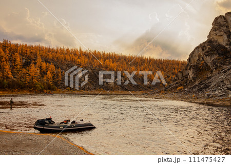 Taiga landscape with fishing boat on the wild northern river. Taiga landscape with fishing boat on the wild northern river. 111475427