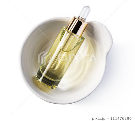 Essential serum Oil in cosmetic bottles with dropper Essential serum Oil in cosmetic bottles with dropper 111476290
