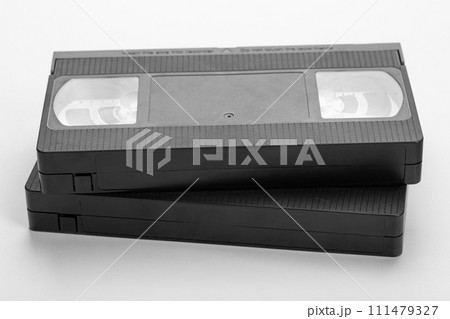 Two videotapes VHS on white background. Two videotapes VHS on white background. 111479327