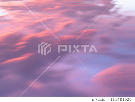 View of Gorgeous of sunset with dramatic pink and blue clouds on sky background. 111481920